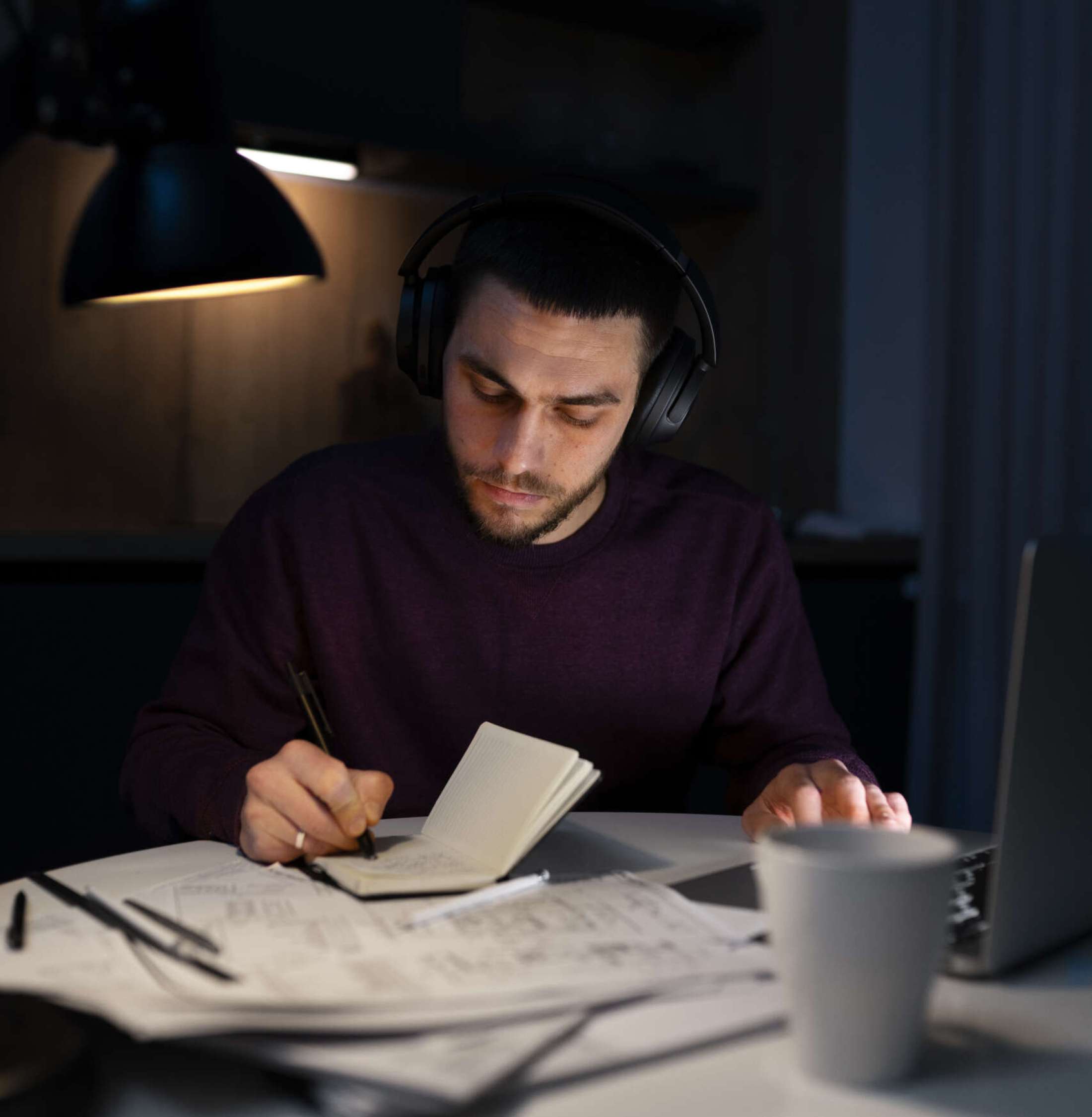 medium-shot-man-working-late-night-laptop